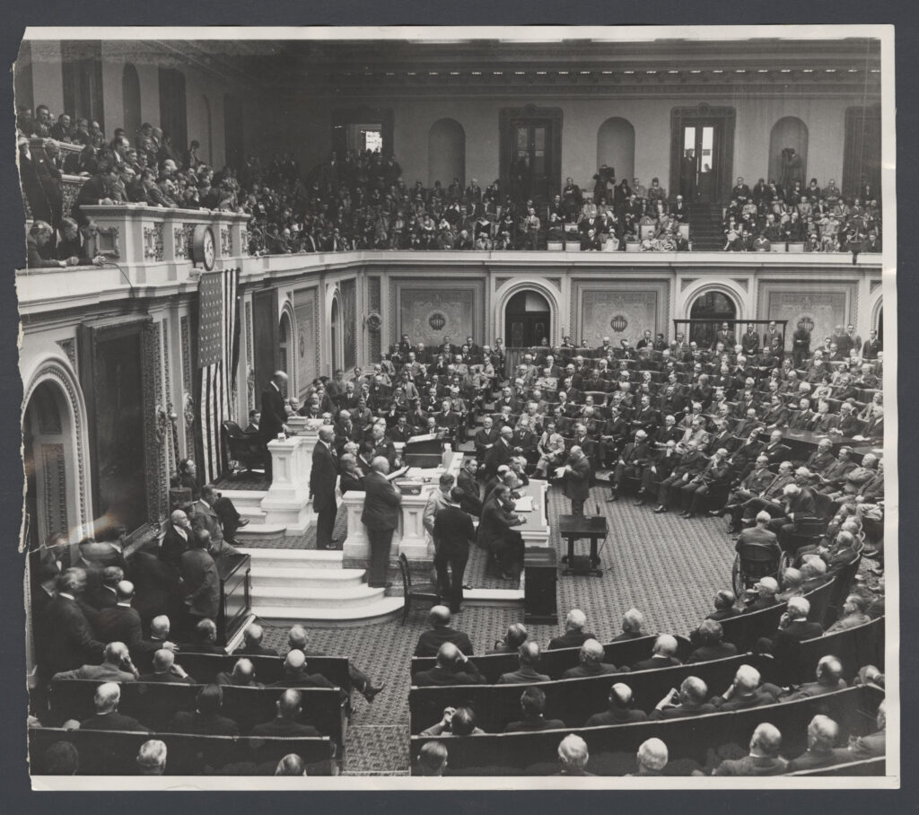 Opening day of the 70th House.
The chamber was largely unchanged until the renovations of the 81st Congress.
Reproduced by permission of the House of Representatives. This is the floor of the House on opening day of the 70th Congress. The chamber remained largely unchanged until the renovation in the 81st Congress. Used with permission of the House of Representatives.